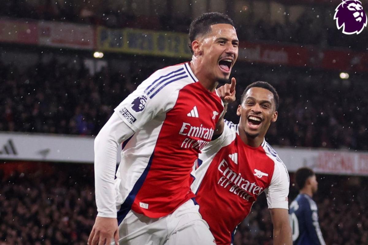 Arsenal's Saliba celebrates scoring the second goal