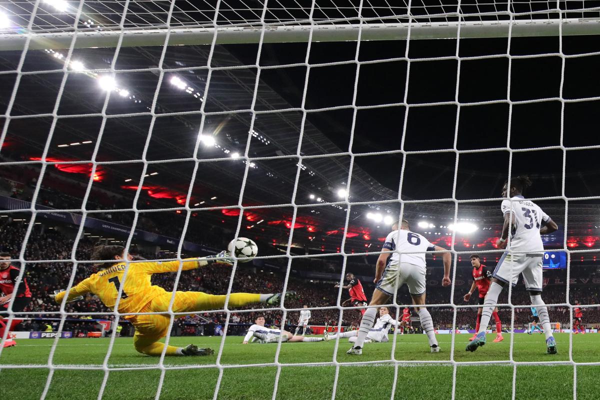 Bayer Leverkusen's Nordi Mukiele scores their first goal against Inter Milan at BayArena,