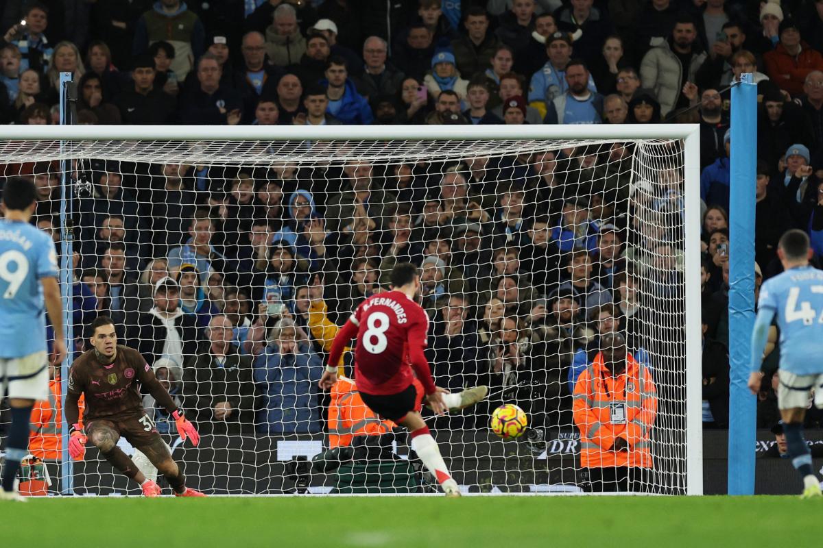 Manchester United's Bruno Fernandes scores their first goal from the penalty spot 