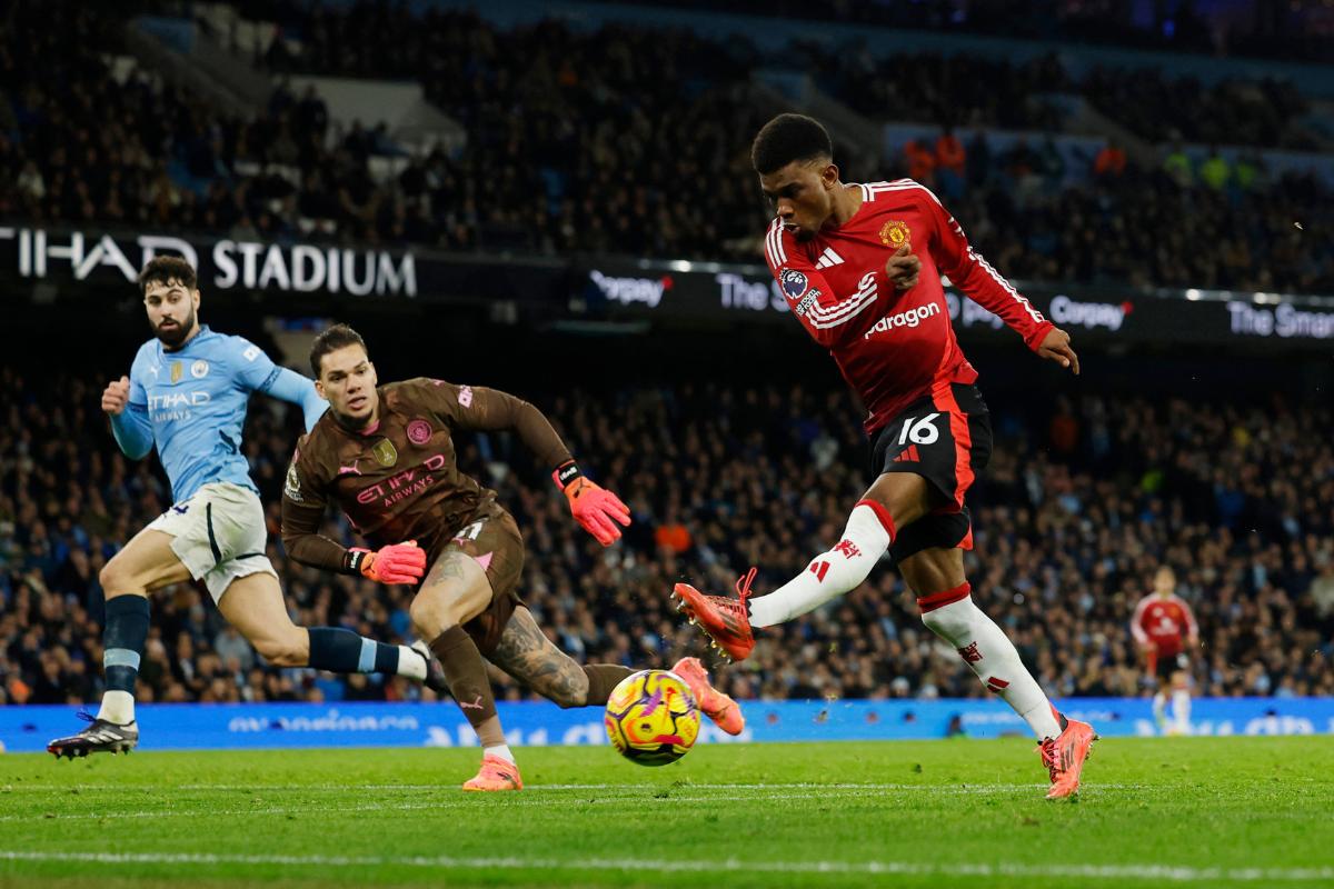 Manchester United's Amad Diallo scores their second goal 