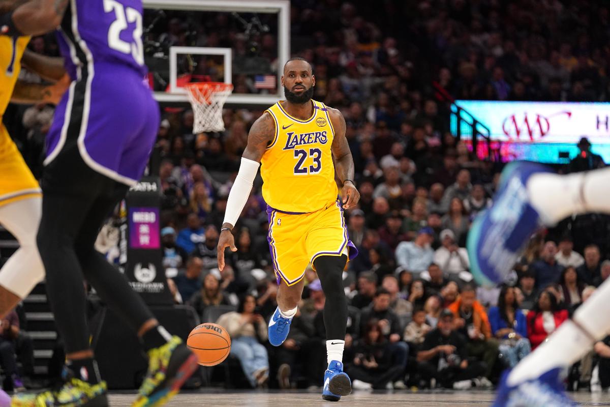 Los Angeles Lakers forward LeBron James (23) dribbles the ball up the court against the Sacramento Kings in the second quarter of their NBA match at the Golden 1 Center in Sacramento, California, USA, on Thursday. 