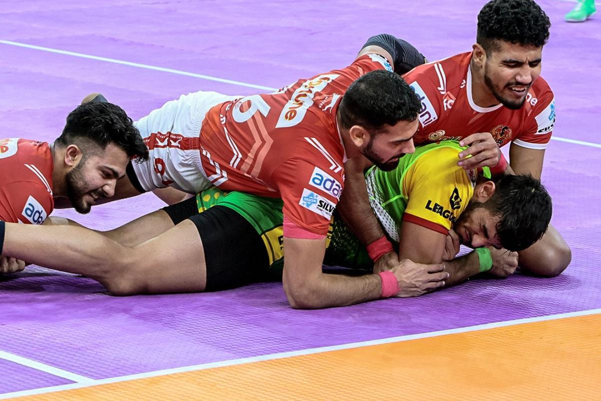 Action from the Pro Kabaddi League match between Patna Pirates and Gujarat in Pune on Saturday