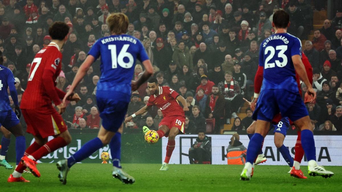 Cody Gakpo scores Liverpool's first goal during the Premier League match against Leicester City at Anfield, on Thursday.