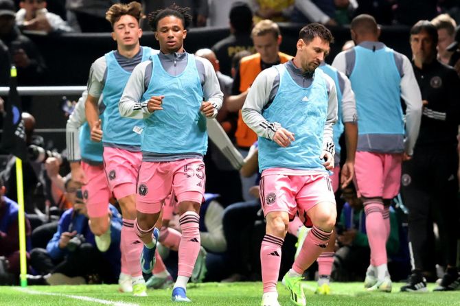 Inter Miami's Lionel Messi warms up with teammates during the match between  Al Nassr and Inter Miami at Kingdom Arena, Riyadh, Saudi Arabia, on Thursday