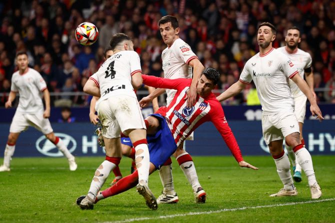 Atletico Madrid's Alvaro Morata in action with Athletic Bilbao's Aitor Paredes during their Copa del Rey semi-final first leg match at Metropolitano, Madrid, on Wednesday 