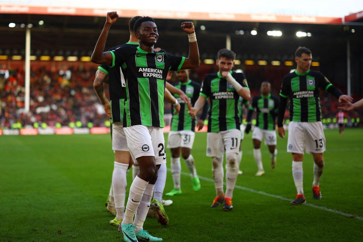 Brighton & Hove Albion's Simon Adingra celebrates with teamates after the match