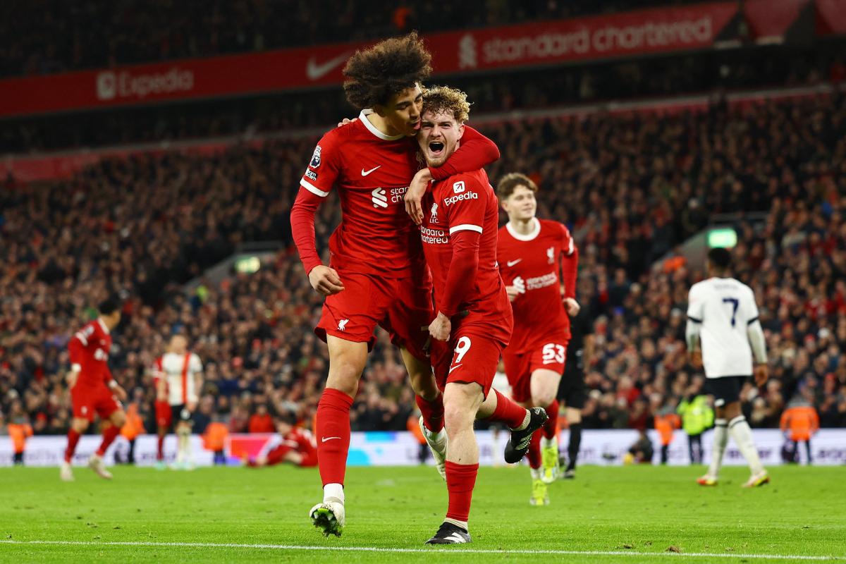 Liverpool's Harvey Elliott celebrates with Jayden Danns on scoring their fourth against Luton Town