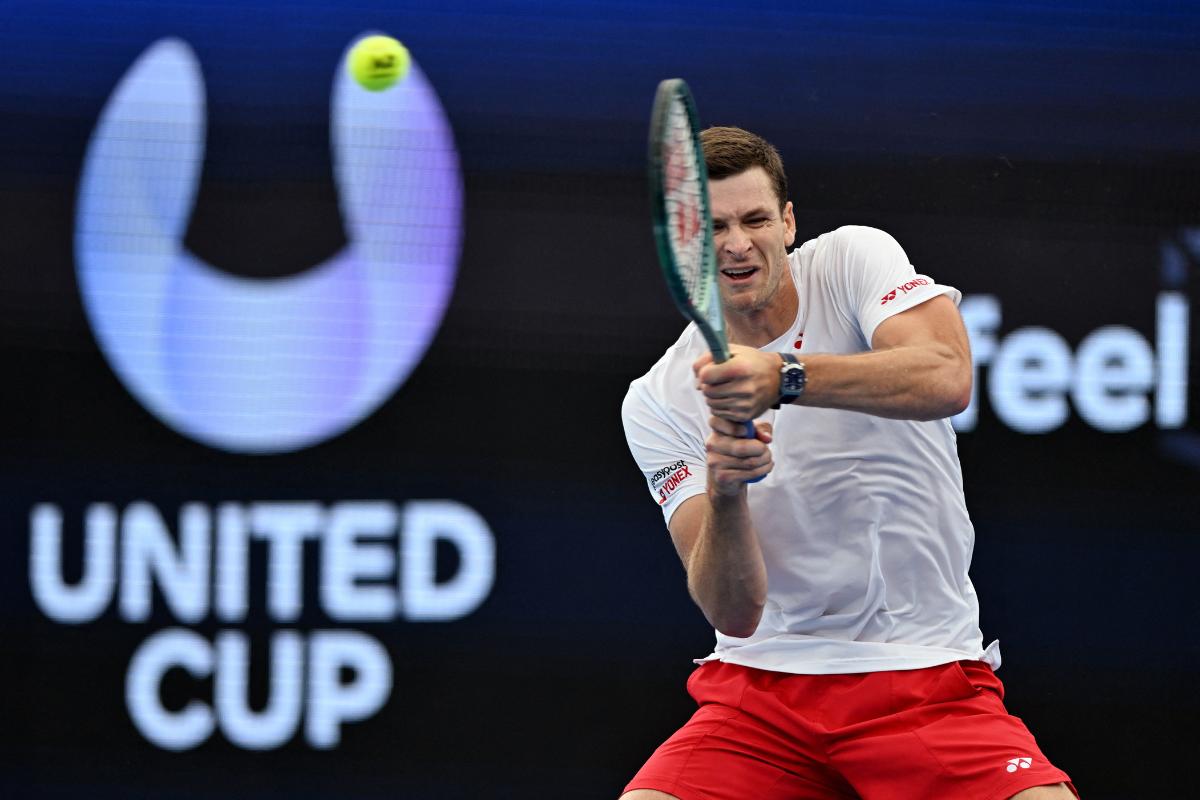 Poland's Hubert Hurkacz in action during the United Cup singles semi-final match against France's Adrian Mannarino at Ken Rosewall Arena, Sydney on Saturday 