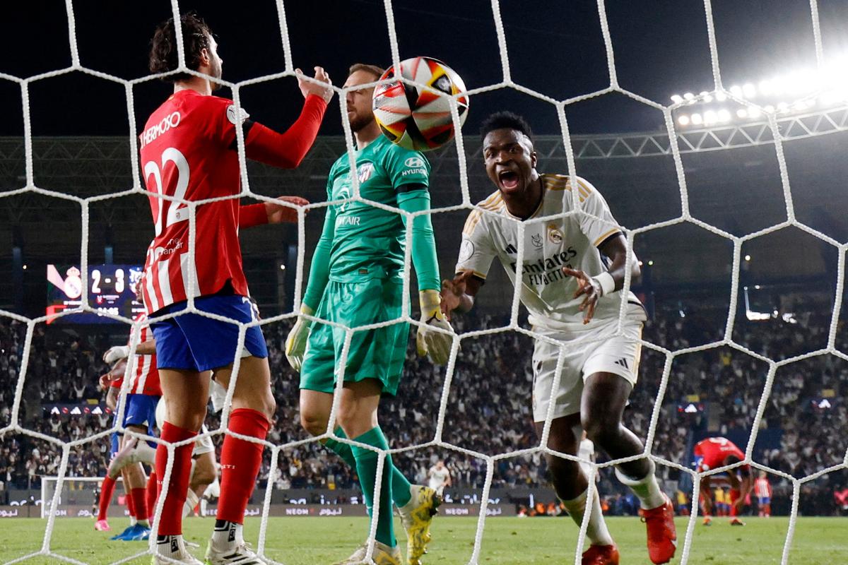 Real Madrid's Vinicius Junior celebrates after Dani Carvajal scored their third goal against Atletico Madrid during their Spanish Super Cup semi final at Al-Awwal Park, Riyadh, Saudi Arabia on Wednesday