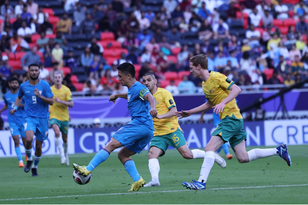 India captain Sunil Chhetri wins the ball as he is challenged by Australian players during their Asian Cup match on Saturday