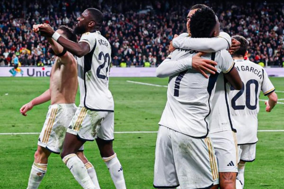 Real Madrid players celebrate their victory over Almeria