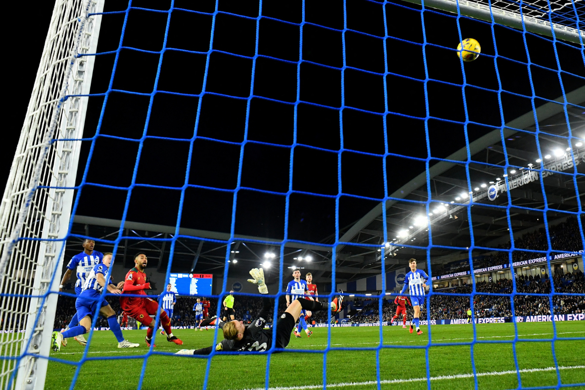 Wolverhampton Wanderers' Matheus Cunha in action with Brighton & Hove Albion's Jason Steele and Pervis Estupinan during their Premier League match at The American Express Community Stadium, Brighton, Britain, on Monday 