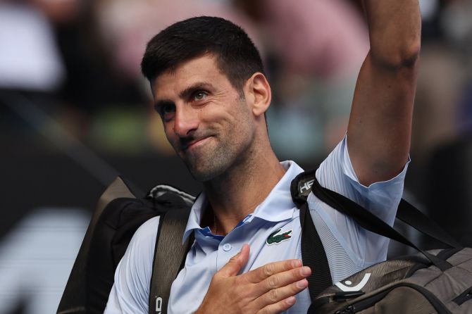 Novak Djokovic waves to the crowd after his semi-final loss to Janik Sinner at the Australian Open in Melbourne on Friday