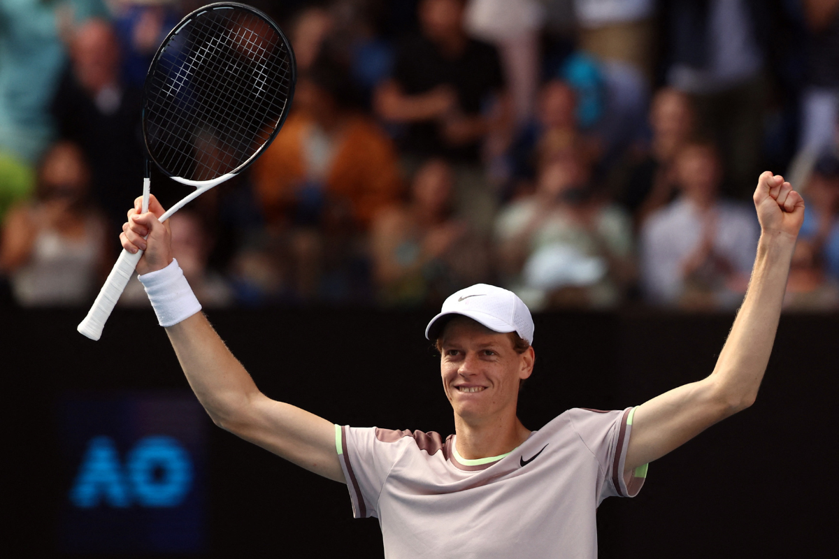 Italy's Jannik Sinner celebrates winning his semi final match against Serbia's Novak Djokovic