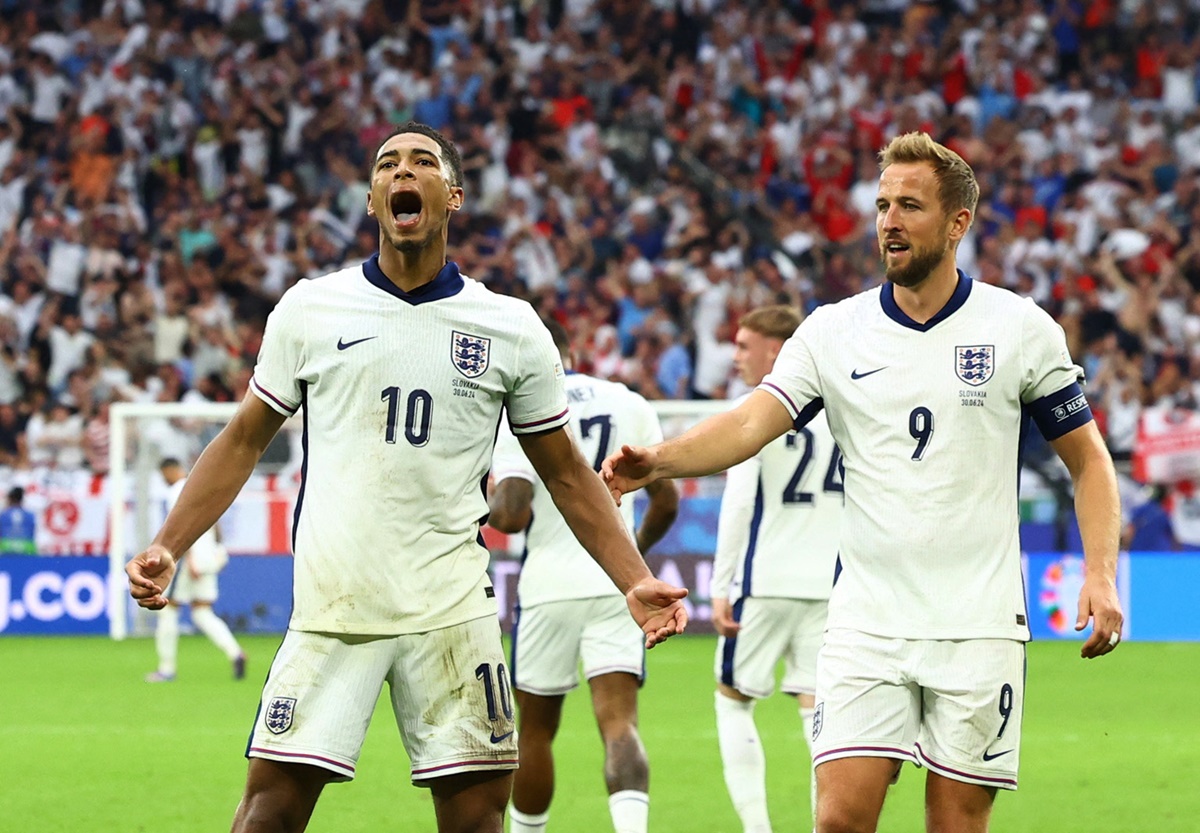 Jude Bellingham celebrates scoring England's first goal with Harry Kane.