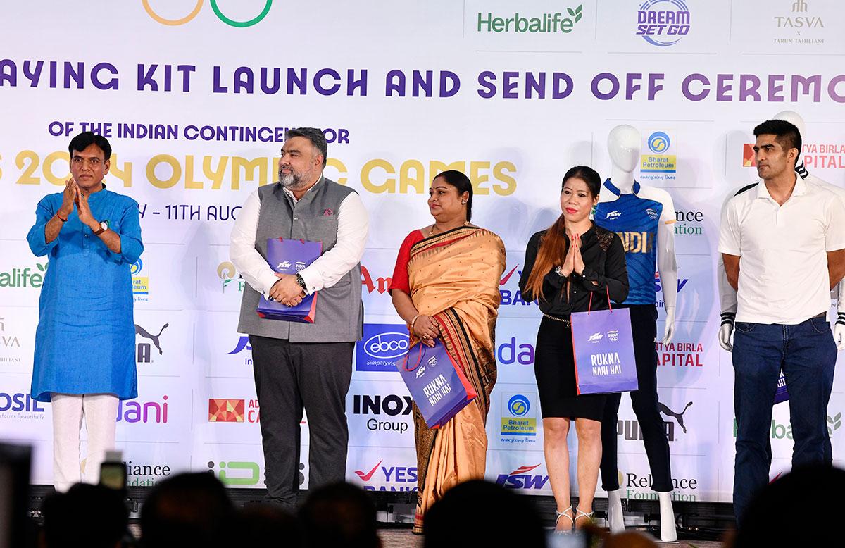 Union Sports and Youth Affairs Minister Mansukh Mandaviya with shooter Gagan Narang, weightlifter Karnam Malleswari and boxers Mary Kom and Vijender Singh