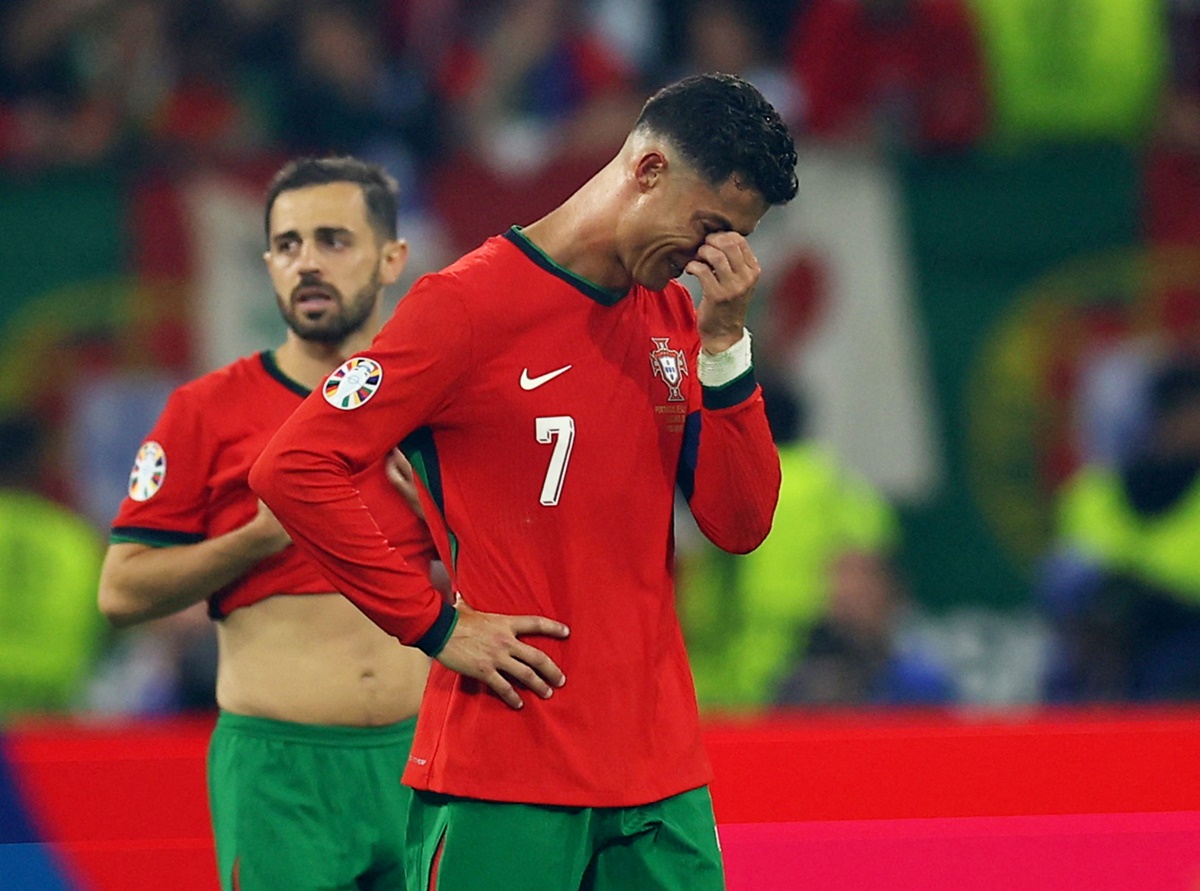  Cristiano Ronaldo reacts after failing to score from the penalty spot in extra-time.