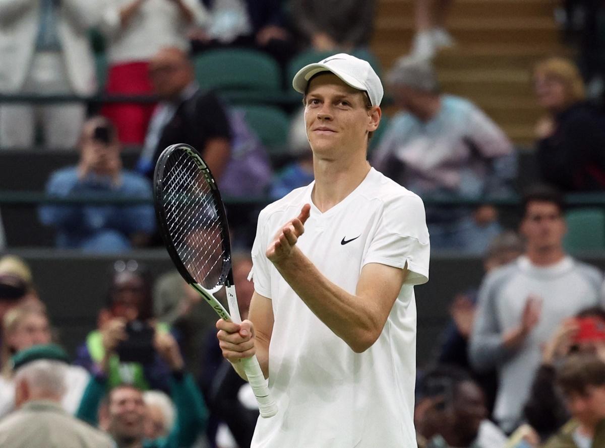 Italy's Jannik Sinner celebrates winning his first round match against Germany's Yannick Hanfmann at Wimbledon on Monday.