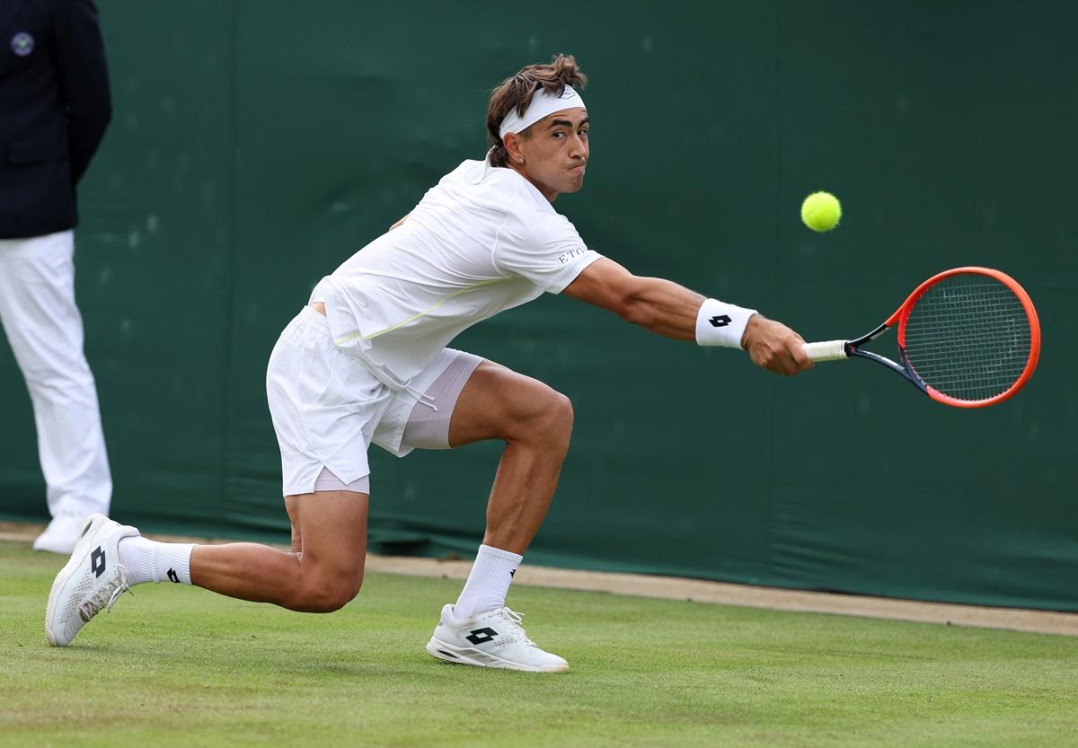 Australia's Francisco Comesana in action during his first round match against Russia's Andrey Rublev.