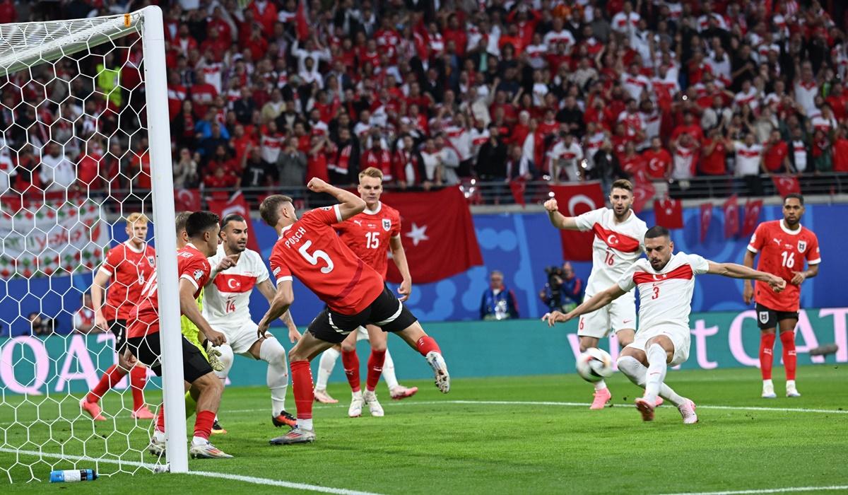 Merih Demiral (No. 3) scores Turkey's first goal.