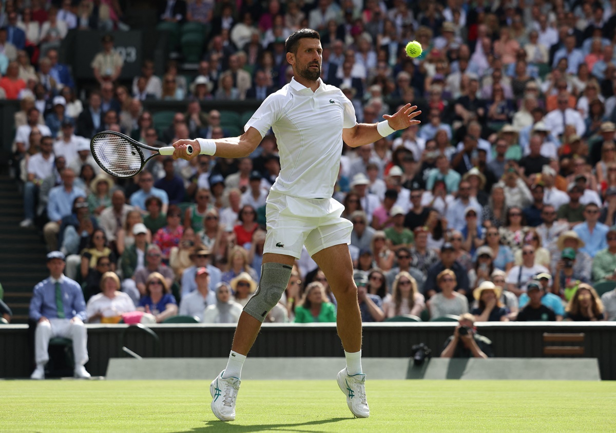 Serbia's Novak Djokovic makes a forehand return during his second round match against Britain's Jacob Fearnley at the Wimbledon Championships on Thursday.