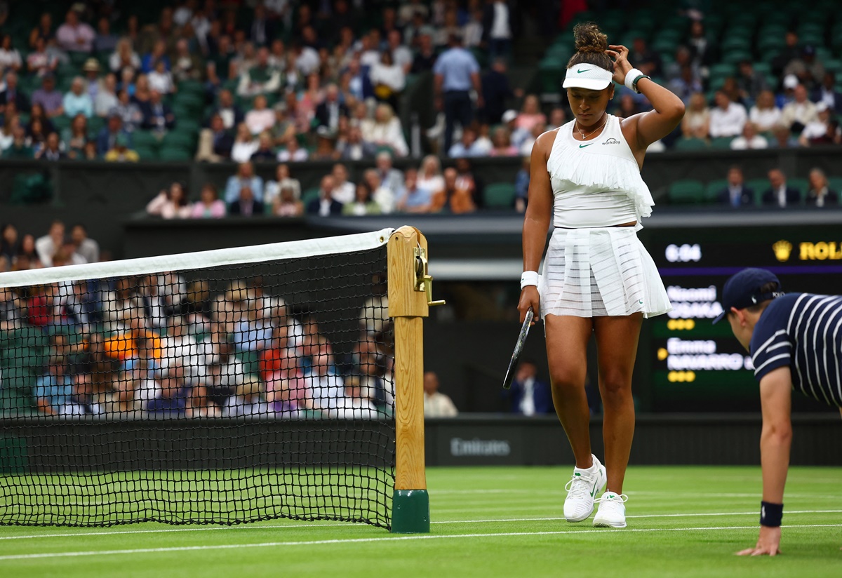 Naomi Osaka reacts after losing the first set.