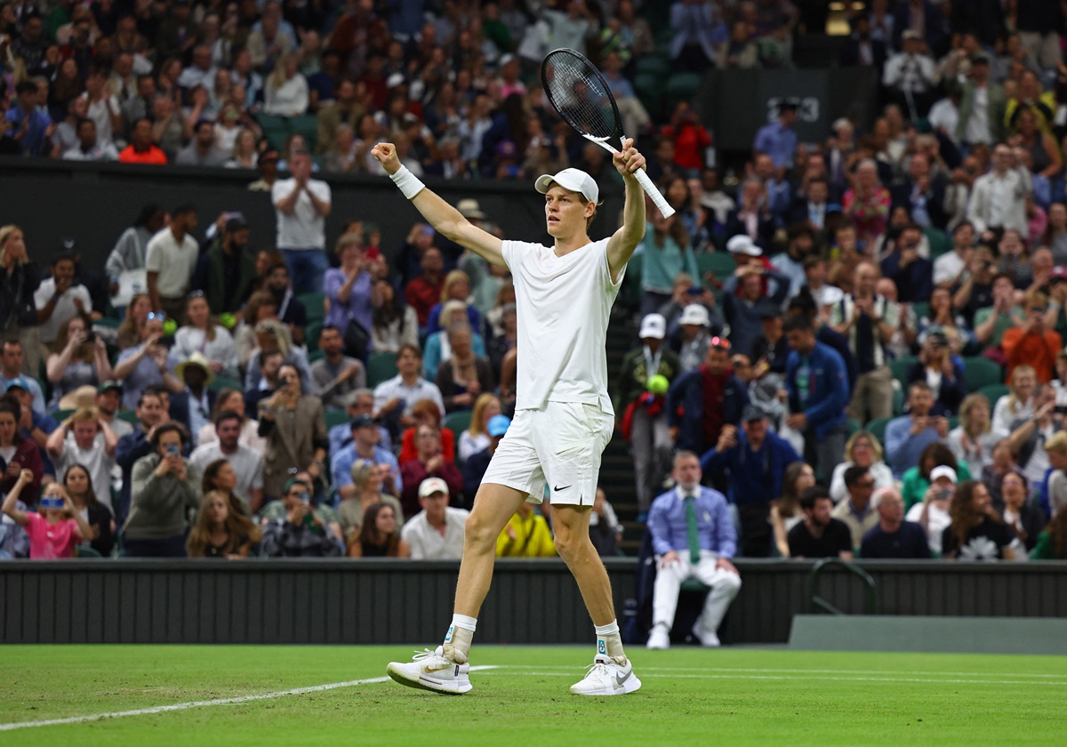 Jannik Sinner celebrates victory over Matteo Berrettini in the second round of the Wimbledon Championships on Wednesday.