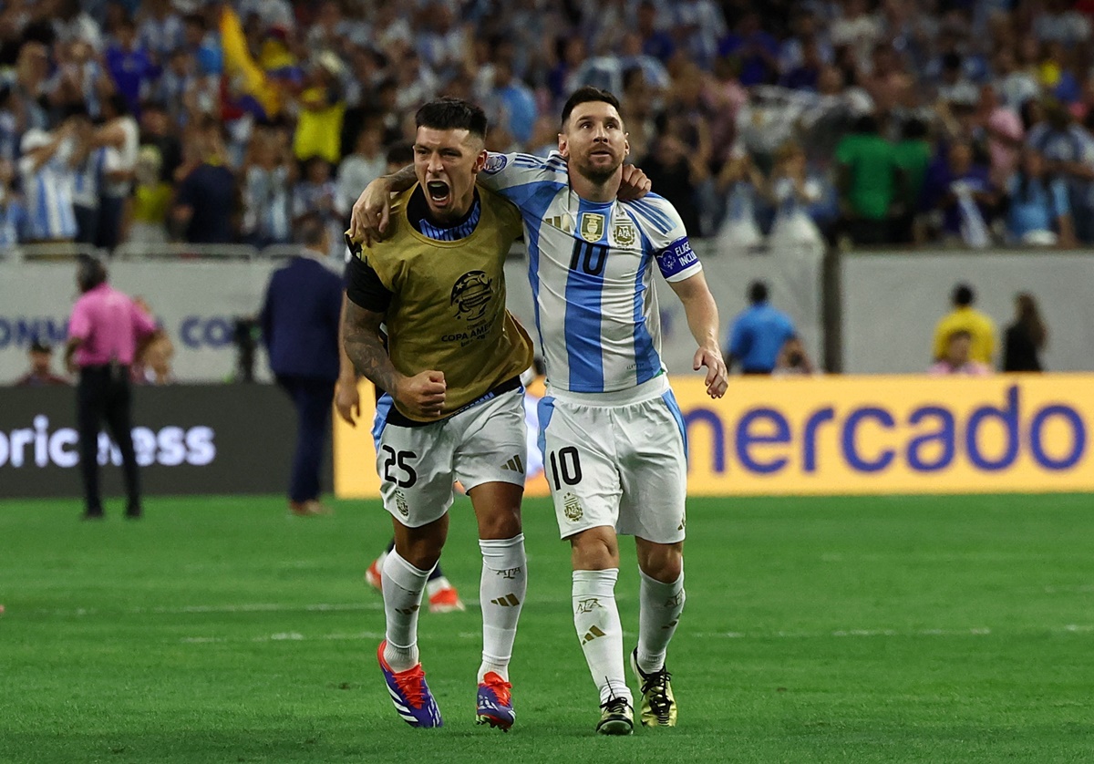 Lionel Messi and Lisandro Martinez celebrate after Argentina beat Ecuador via the penalty shoot-out in the Copa America quarter-finals at NRG Stadium, Houston, Texas, on Thursday.