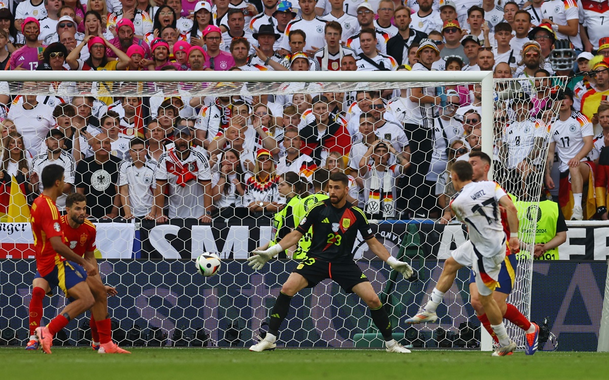 Florian Wirtz (No. 17) scores late in the second half to enable Germany draw level with Spain