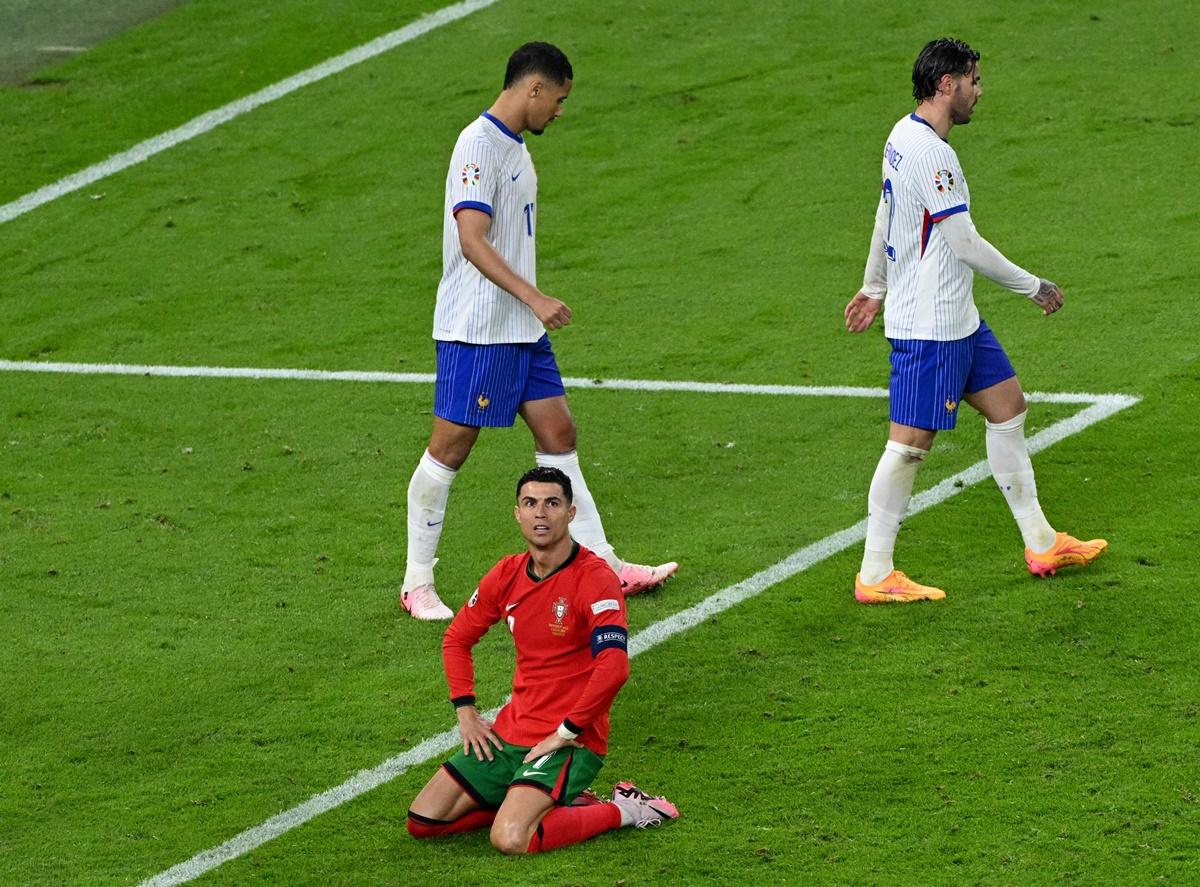 Cristiano Ronaldo looks dejected after missing a chance to score.