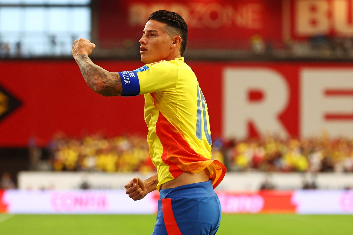 Colombia captain James Rodriguez celebrates scoring from the penalty spot.