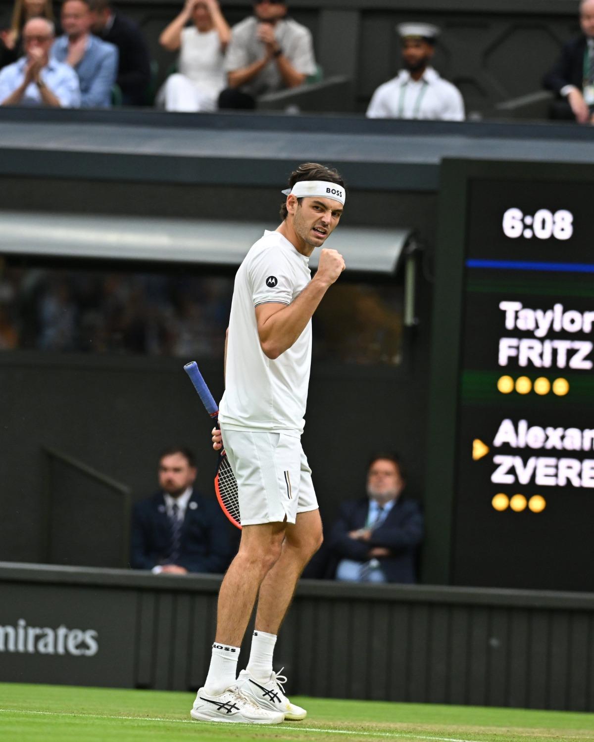 USA's Taylor Fritz  celebrates after winning his fourth round match against Germany's Alexander Zverev