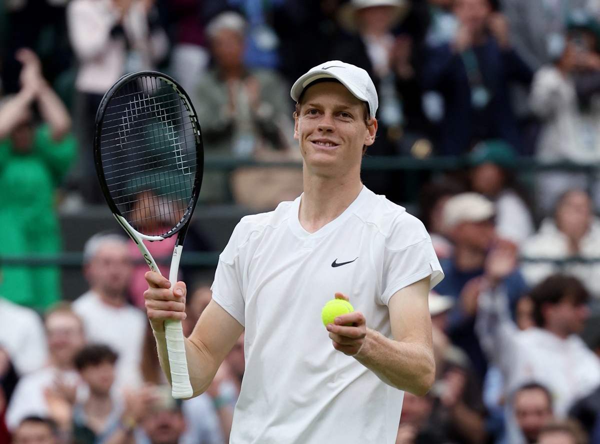 Italy's Jannik Sinner celebrates winning his fourth round match against Ben Shelton of the United States.