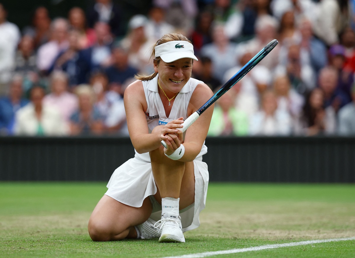 New Zealand's Lulu Sun celebrates winning her fourth round match against Britain's Emma Raducanu at Wimbledon on Sunday.