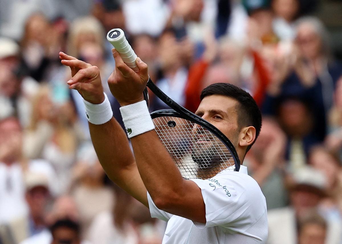 Serbia's Novak Djokovic celebrates victory over Italy's Lorenzo Musetti in the men's singles semi-final at the Wimbledon Championships on Friday.