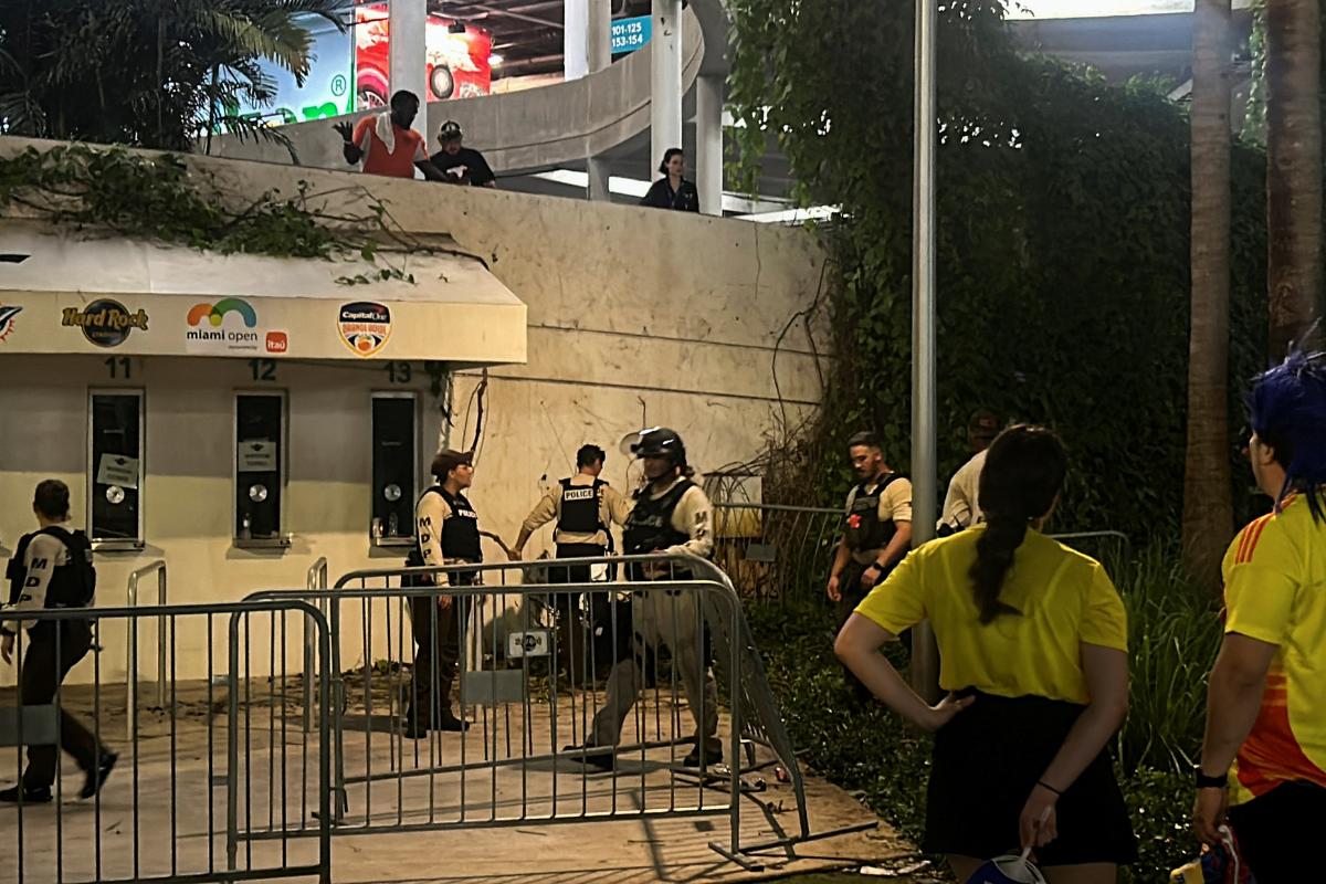 Police stand guard as fans are not allowed to enter the Hard Rock Stadium for the Copa America Finals between Argentina and Colombia in Miami Gardens, Florida