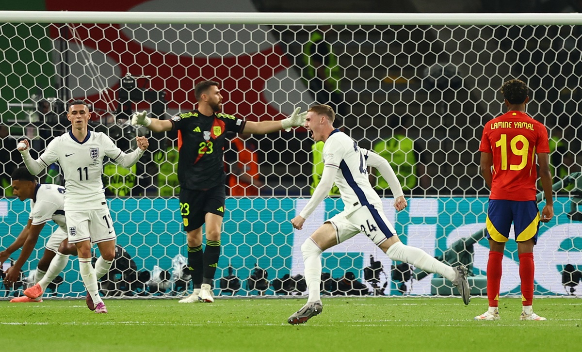 Cole Palmer (No. 24) celebrates restoring parity for England in the Euro final against Spain