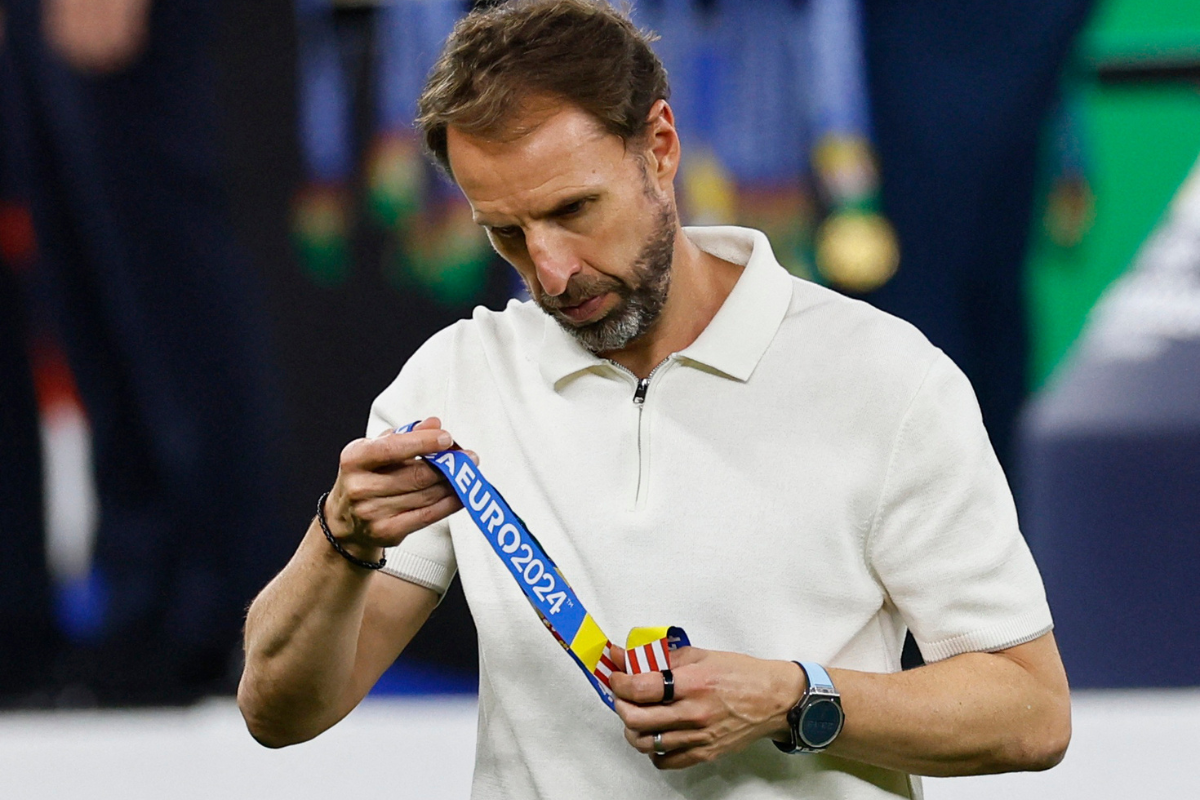 England manager Gareth Southgate looks dejected after collecting his runners up medal