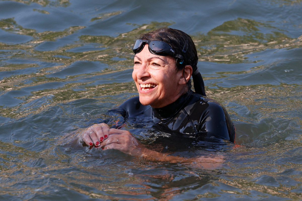 Paris mayor Anne Hidalgo swims in the River Seine, on Wednesday, July 17, ahead of the Paris Olympics.