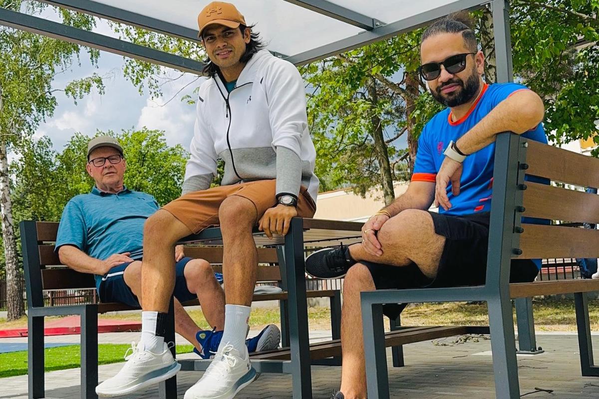 Neeraj Chopra with his coach and biomechanics expert Dr Klaus Bartonietz and physio Ishaan Marwaha