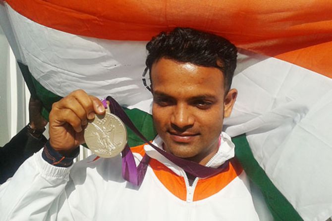 Shooter Vijay Kumar with his 2012 Olympic medal