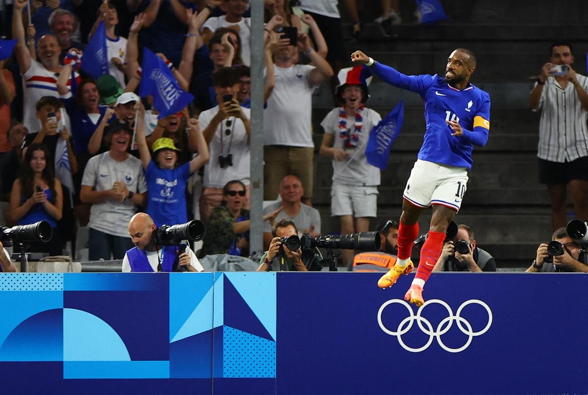 Alexandre Lacazette celebrates putting France ahead in the men's Group A match against the United States of America, at Marseille Stadium.