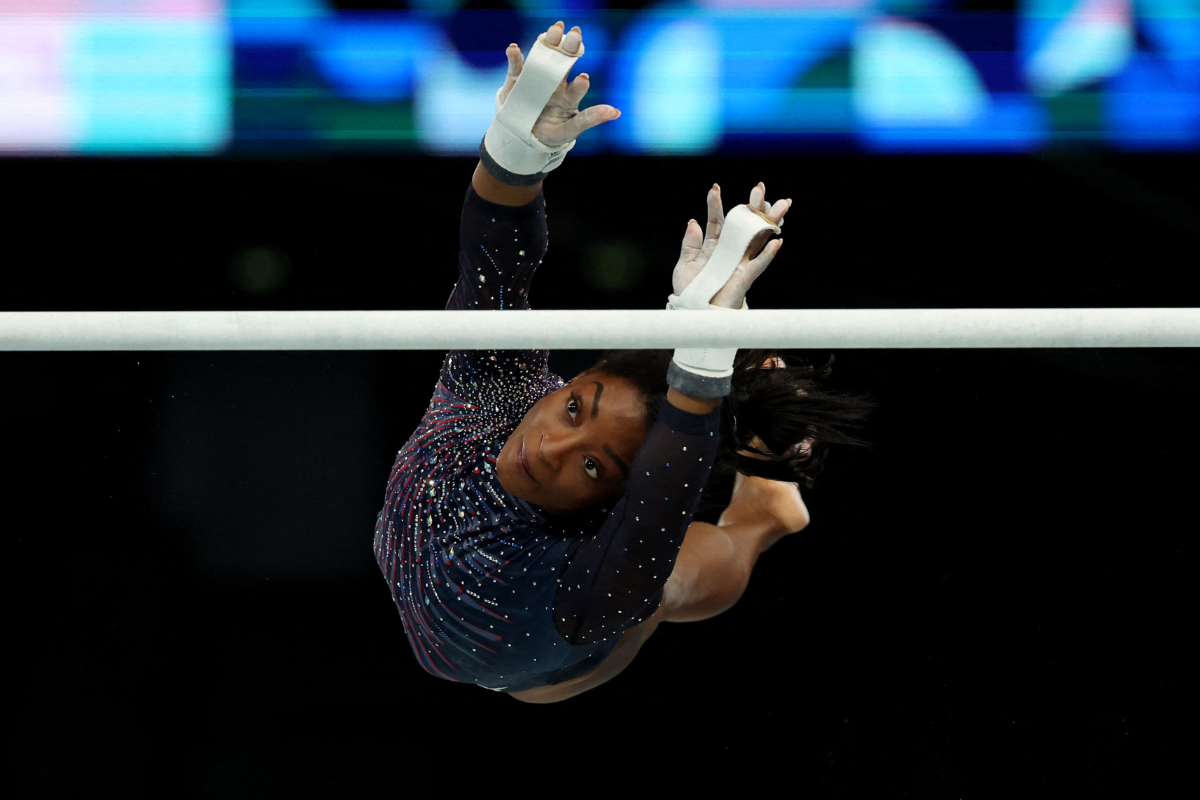 Simone Biles of United States on the uneven bars during training on Thursday, July 25
