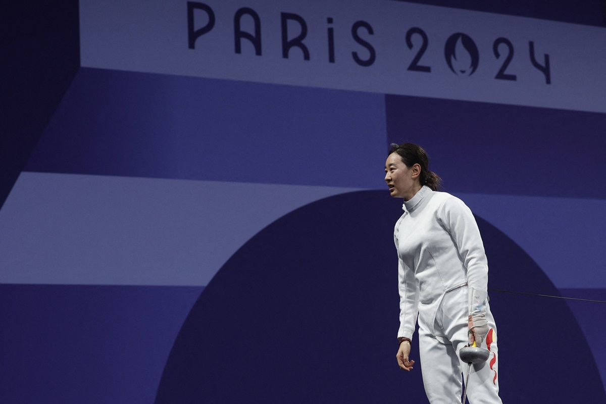 China's Yiwen Sun reacts after losing to Japan's Miho Yoshimura in the Olympics women's Epee Individual Table of 32 round at Grand Palais, Paris, on Saturday.