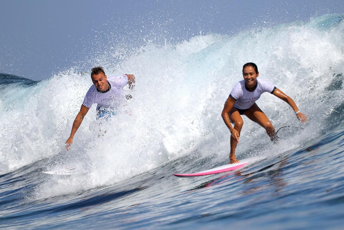 France's Vahine Fierro and Kauli Vaast during training for the Olympics surfing competition, at Teahupo'o, Tahiti, French Polynesia.