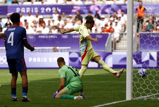 Miguel Gutierrez scores Spain's third goal in the Olympics men's Group C match against Dominican Republic at Bordeaux Stadium, France, on Saturday.