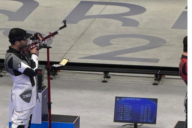 Arjuna Babuta in action during the 10m Air Rifle final on Monday