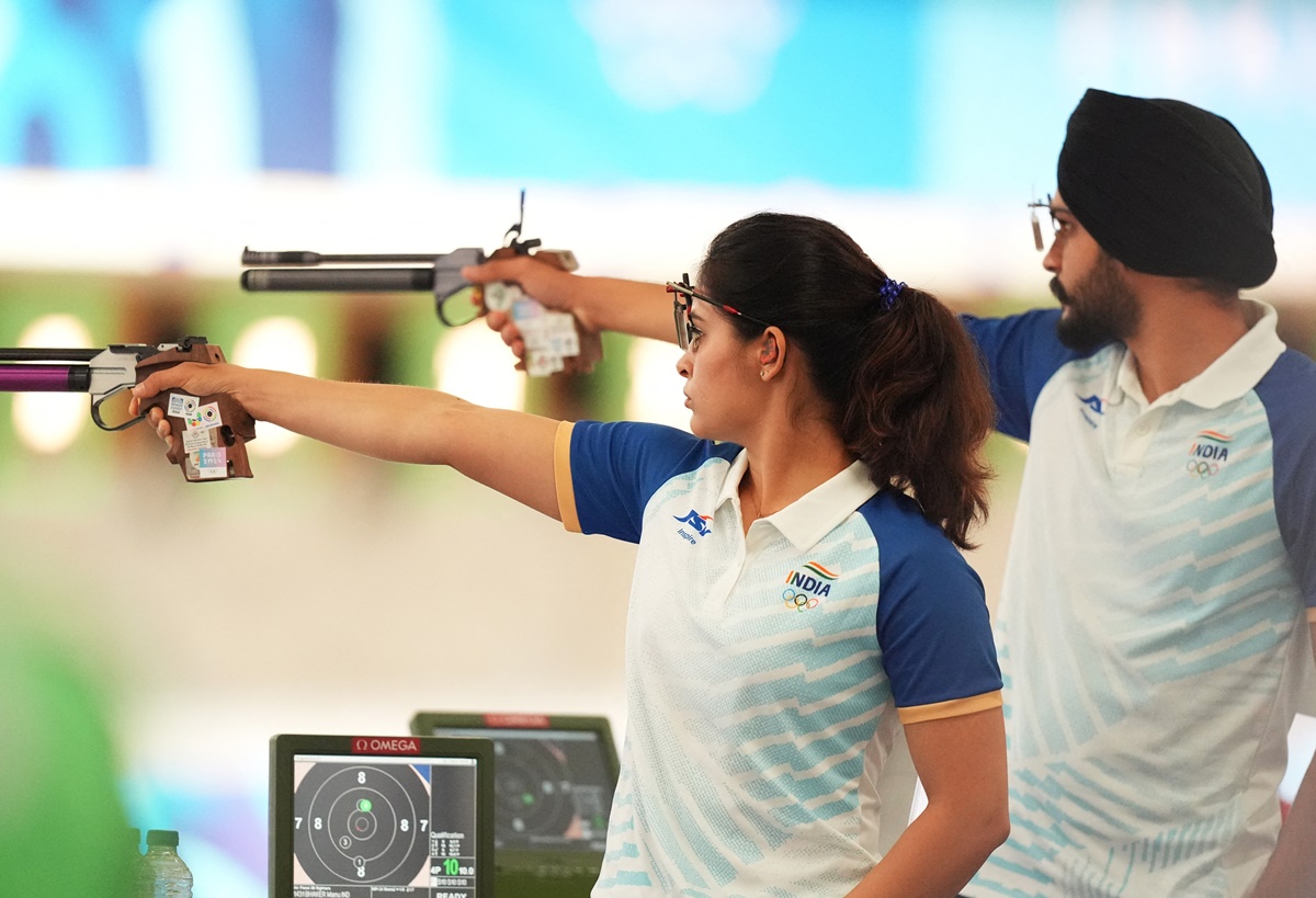 Manu Bhaker and Sarabjot Singh in action during the 10m air pistol mixed qualification event on Monday