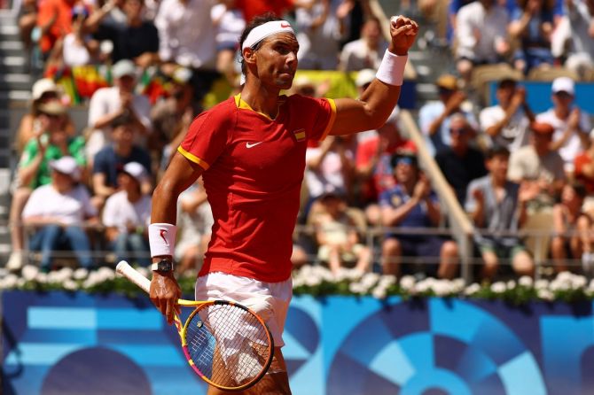 Spain's Rafael Nadal reacts after winning a game during his Olympics men's singles match against Serbia's Novak Djokovic at Roland Garros, Paris, on Monday.