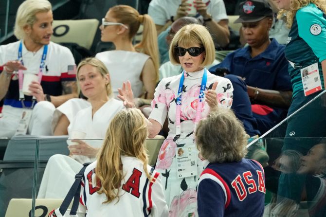 Vogue editor Anna Wintour talks with David Lauren during women’s qualification during the Paris 2024 Olympic Summer Games at Bercy Arena
